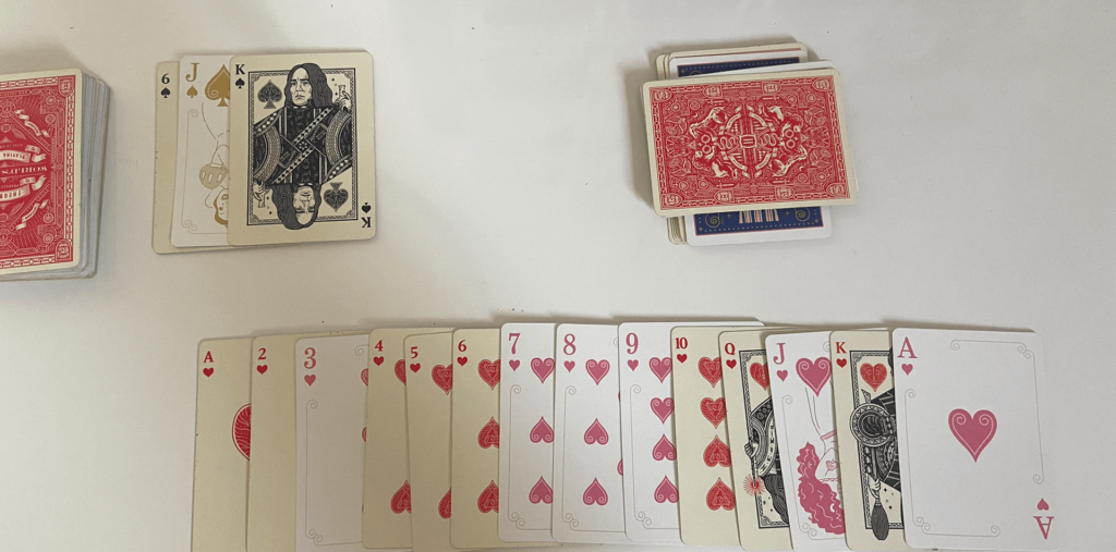 como jogar buraco canastra real